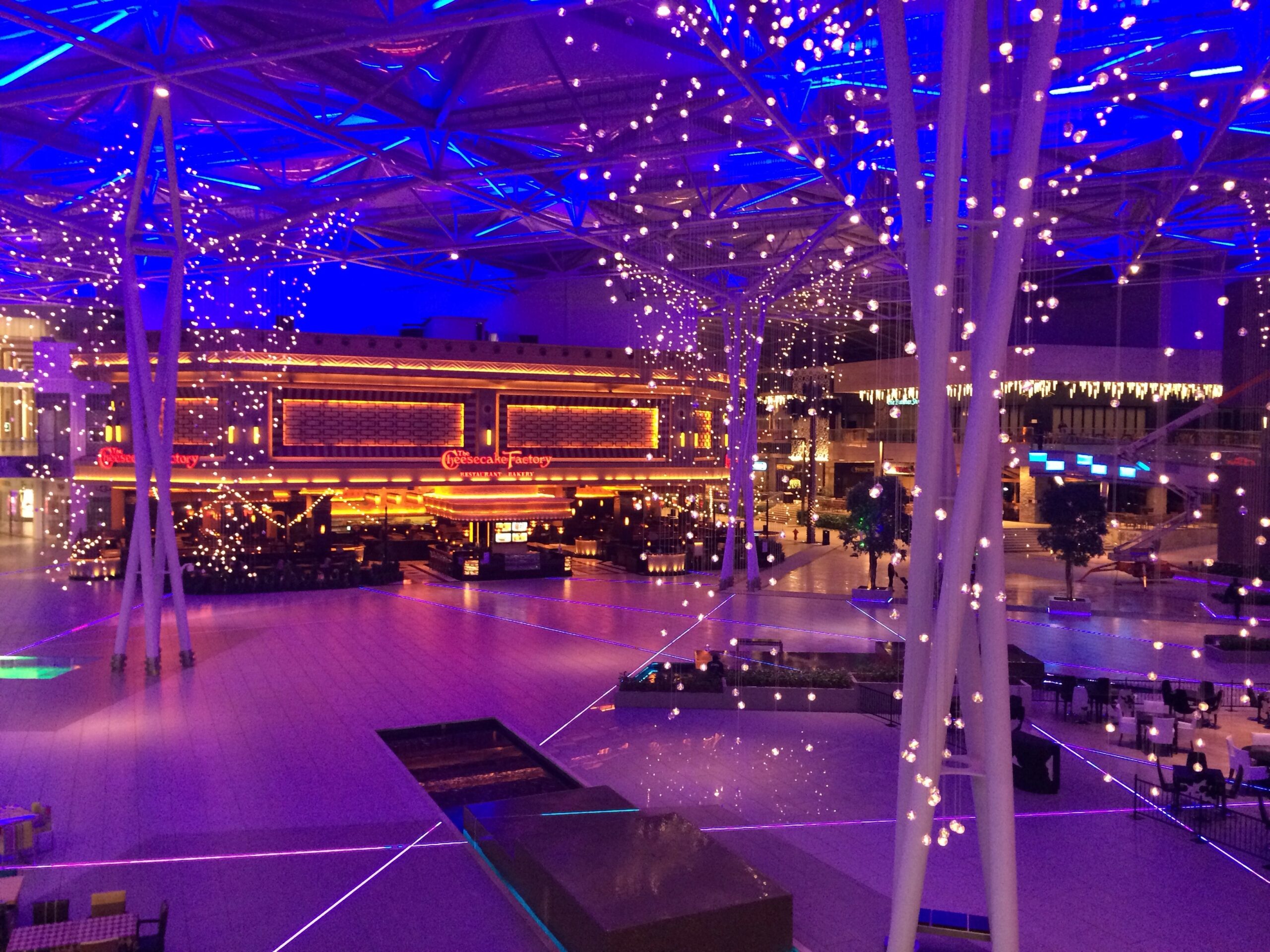 a low light event venue decorated with string lights